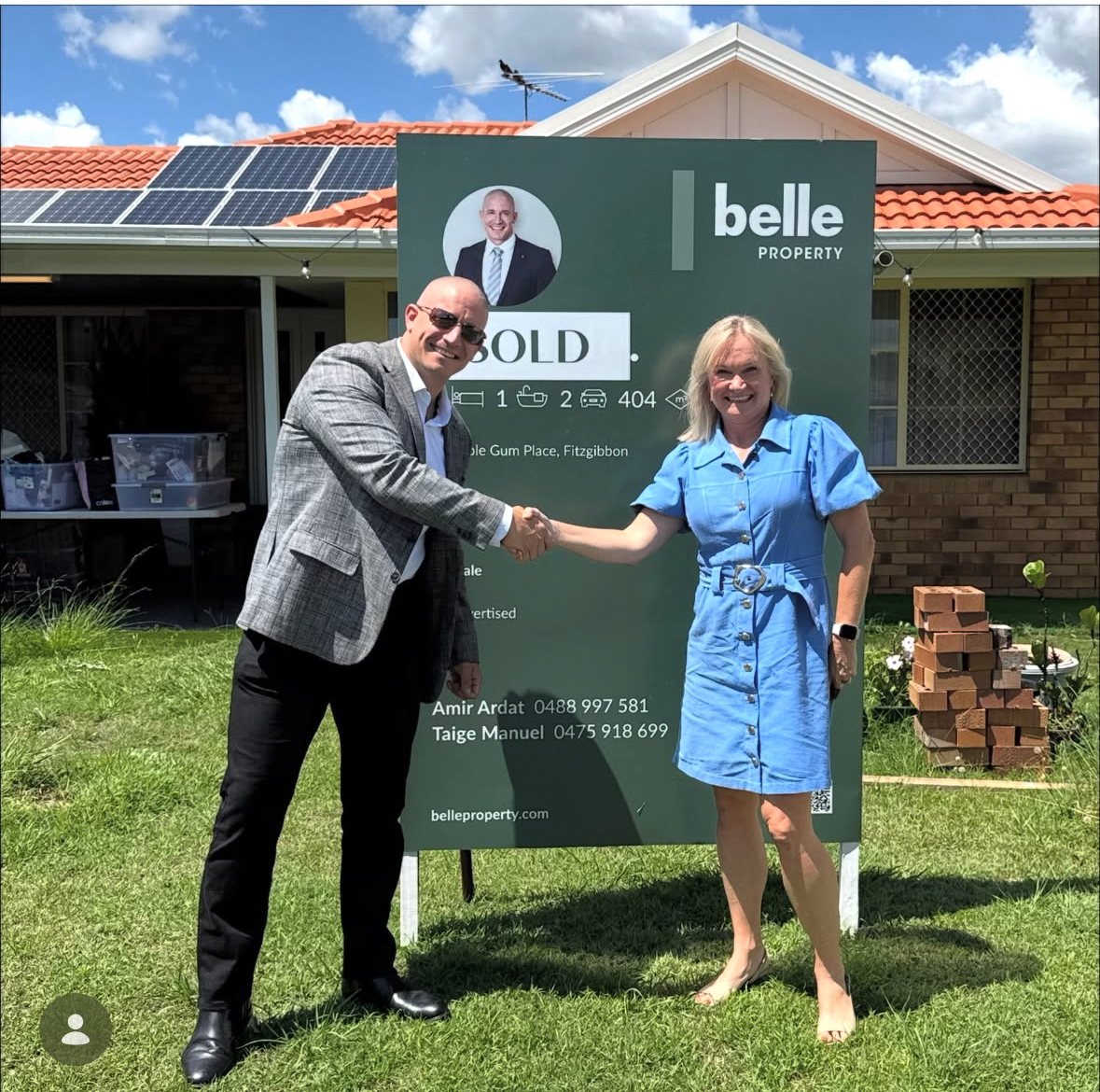 Clients celebrating their successful property purchase