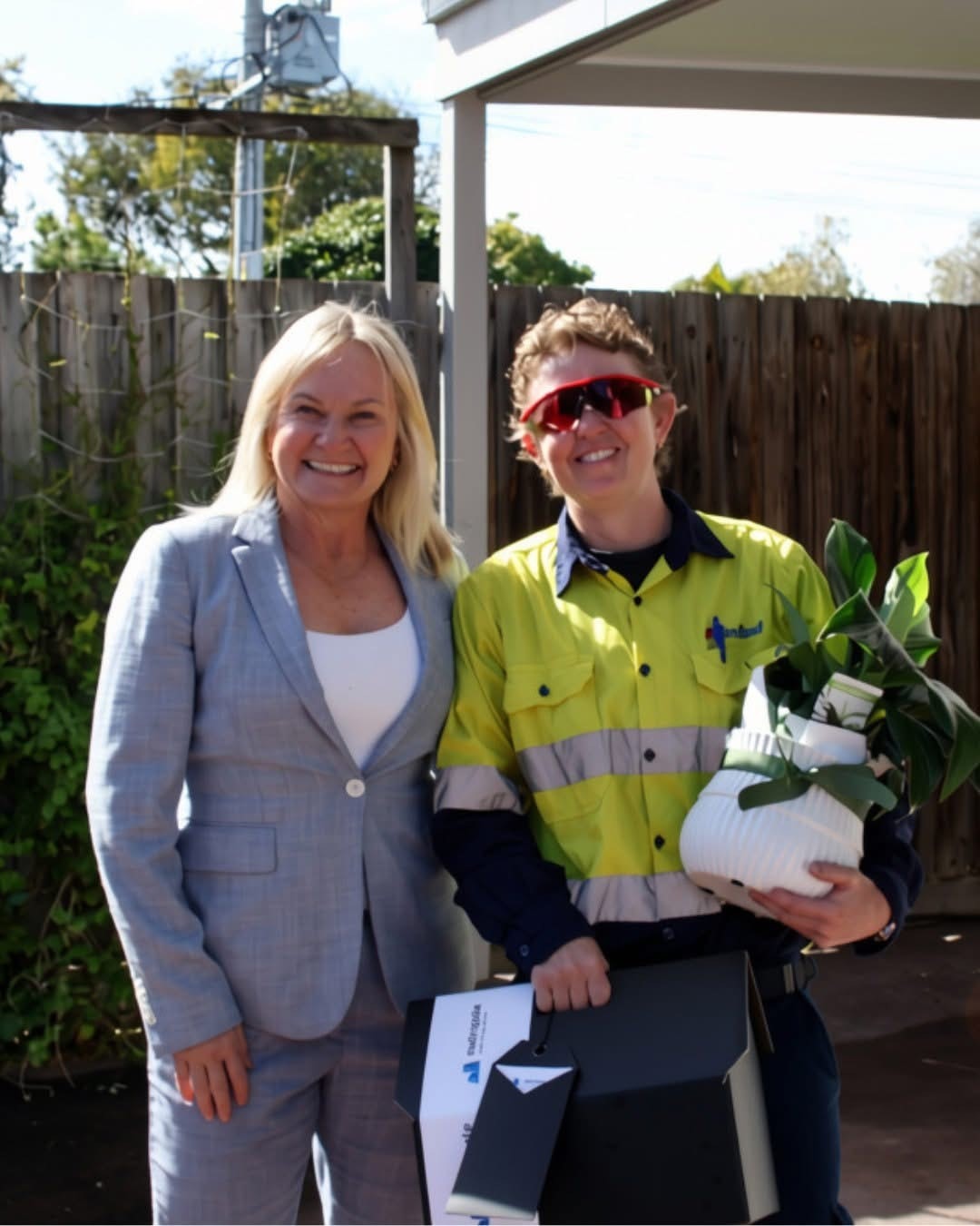 Alecia Zillman celebrating with happy Brisbane property buyers